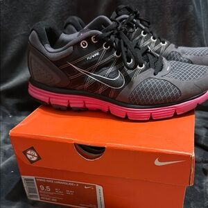 Nike Black and Pink Athletic Shoes with Cushioned Soles
